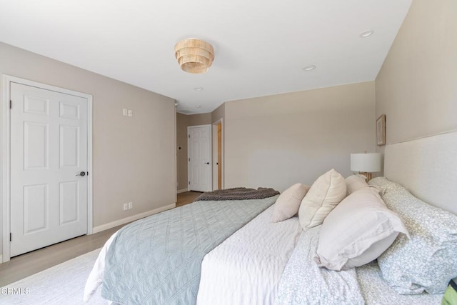 5907 Cantaloupe Ave, Valley Glen, CA 91401 - bedroom with light wood-style flooring and recessed lighting
