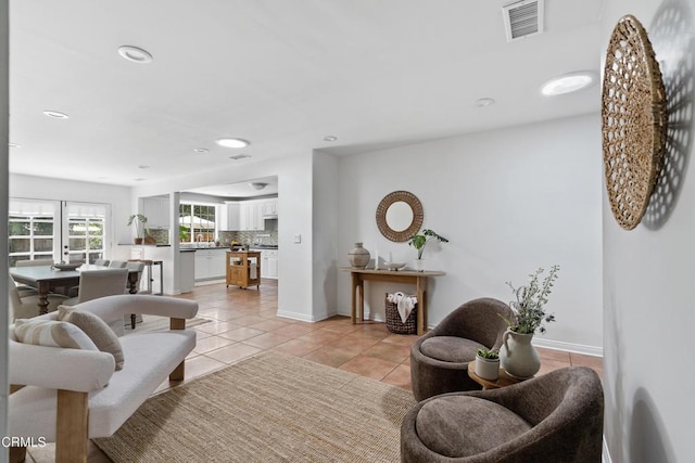 5907 Cantaloupe Ave, Valley Glen, CA 91401 - living area with light tile patterned floors and recessed lighting