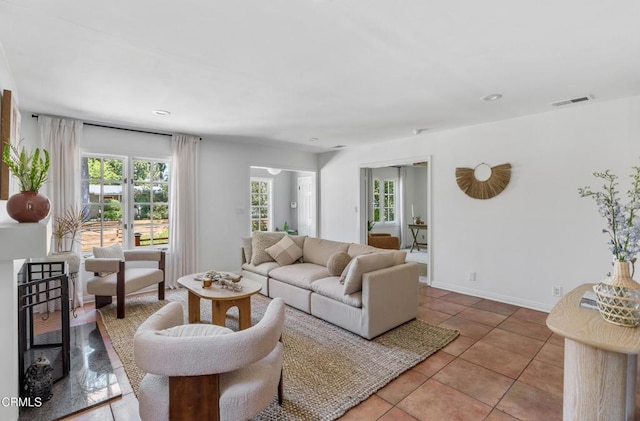 5907 Cantaloupe Ave, Valley Glen, CA 91401 - living room featuring light tile patterned floors and recessed lighting