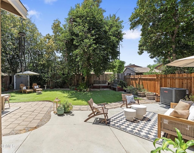 5907 Cantaloupe Ave, Valley Glen, CA 91401 - fenced backyard featuring a storage shed, a patio area, and an outdoor living space