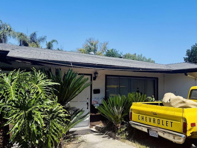1862 Washington St, Lemon Grove, CA 91945 - view of side of home with roof with shingles and stucco siding