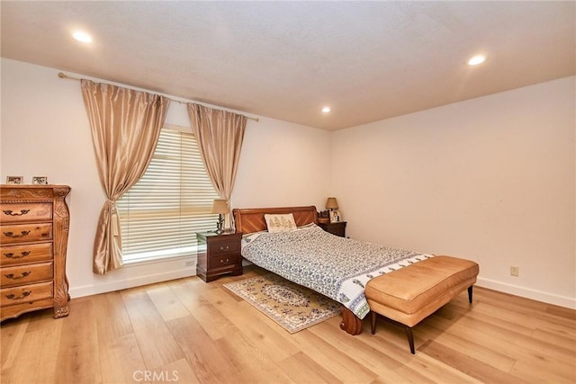 5574 Elsinore Ave, Buena Park, CA 90621 - bedroom with wood finished floors and recessed lighting