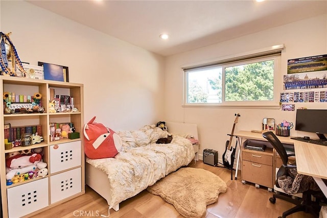 5574 Elsinore Ave, Buena Park, CA 90621 - bedroom with wood finished floors, a desk, and recessed lighting