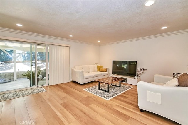 5574 Elsinore Ave, Buena Park, CA 90621 - living room featuring ornamental molding, light wood-style floors, and recessed lighting