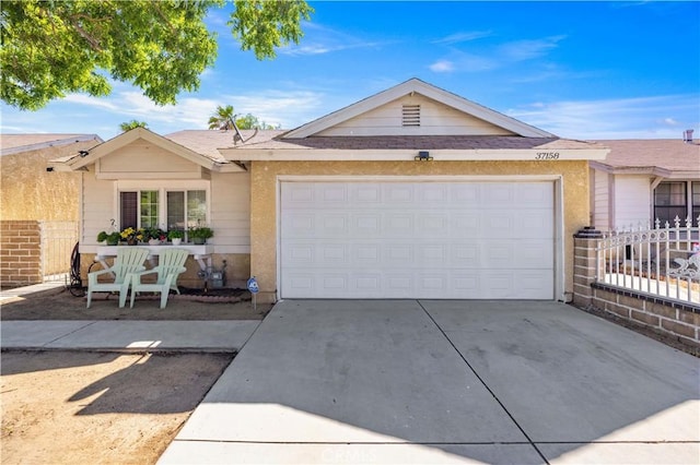 37158 29th St E, Palmdale, CA 93550 - ranch-style home featuring a garage and driveway