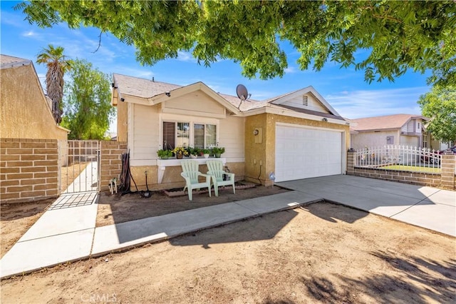 37158 29th St E, Palmdale, CA 93550 - single story home featuring an attached garage, a gate, and driveway