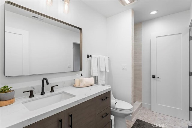 1016 Berne Dr, Crestline, CA 92325 - full bathroom with vanity, a tile shower, and recessed lighting