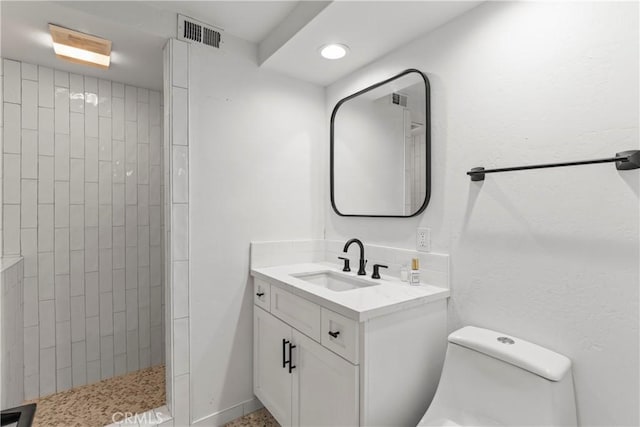 1016 Berne Dr, Crestline, CA 92325 - bathroom featuring vanity, tiled shower, and recessed lighting