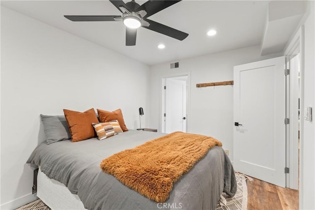 1016 Berne Dr, Crestline, CA 92325 - bedroom with wood finished floors, recessed lighting, and a ceiling fan