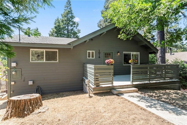 1016 Berne Dr, Crestline, CA 92325 - back of house featuring a deck