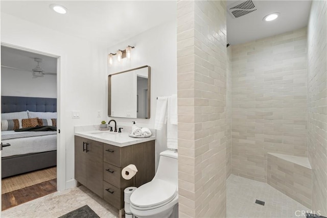 1016 Berne Dr, Crestline, CA 92325 - bathroom with vanity, ensuite bathroom, tile patterned floors, a tile shower, and recessed lighting