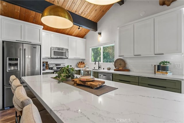 1016 Berne Dr, Crestline, CA 92325 - kitchen featuring appliances with stainless steel finishes, wood ceiling, backsplash, light stone counters, and white cabinetry