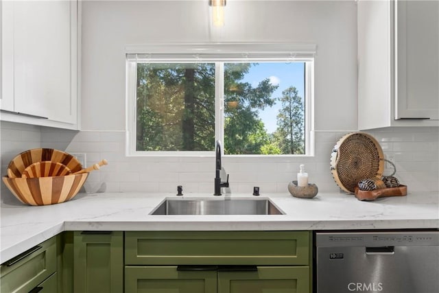 1016 Berne Dr, Crestline, CA 92325 - kitchen featuring green cabinets, stainless steel dishwasher, backsplash, and light stone countertops