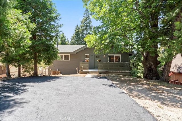 1016 Berne Dr, Crestline, CA 92325 - view of front of property featuring a deck and driveway