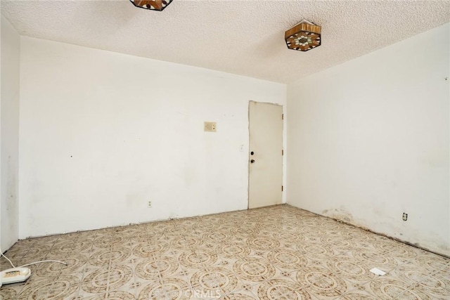448 Via El Chico, Redondo Beach, CA 90277 - unfurnished room featuring a textured ceiling