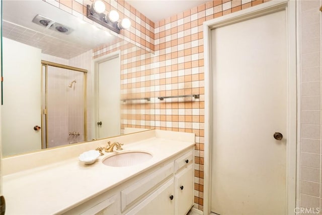 448 Via El Chico, Redondo Beach, CA 90277 - full bathroom featuring vanity, a shower stall, and tile walls