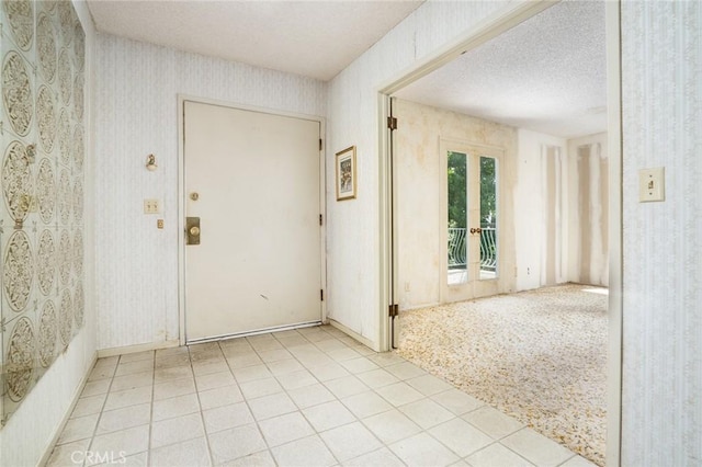 448 Via El Chico, Redondo Beach, CA 90277 - spare room featuring wallpapered walls and a textured ceiling