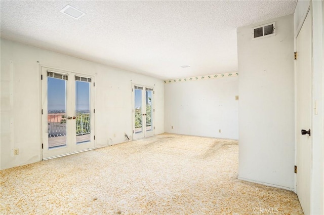 448 Via El Chico, Redondo Beach, CA 90277 - carpeted spare room with french doors and a textured ceiling