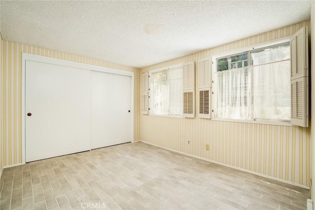 448 Via El Chico, Redondo Beach, CA 90277 - unfurnished room featuring wood finished floors and a textured ceiling