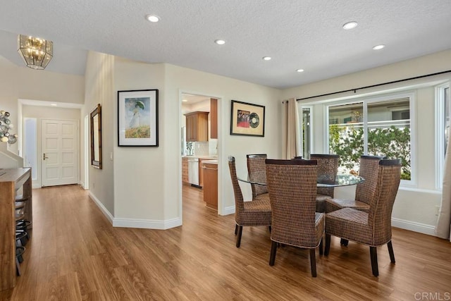 4763 Miletus Way, Oceanside, CA 92056 - dining space featuring light wood finished floors, a textured ceiling, and recessed lighting