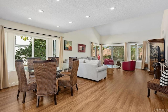 4763 Miletus Way, Oceanside, CA 92056 - dining room featuring a textured ceiling, lofted ceiling, light wood finished floors, and recessed lighting
