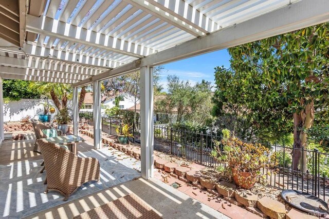 4763 Miletus Way, Oceanside, CA 92056 - fenced backyard featuring a pergola and a patio area