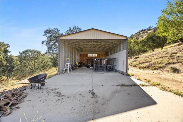 27861 Cummings Valley Rd, Tehachapi, CA 93561 - view of outbuilding with a detached carport and concrete driveway