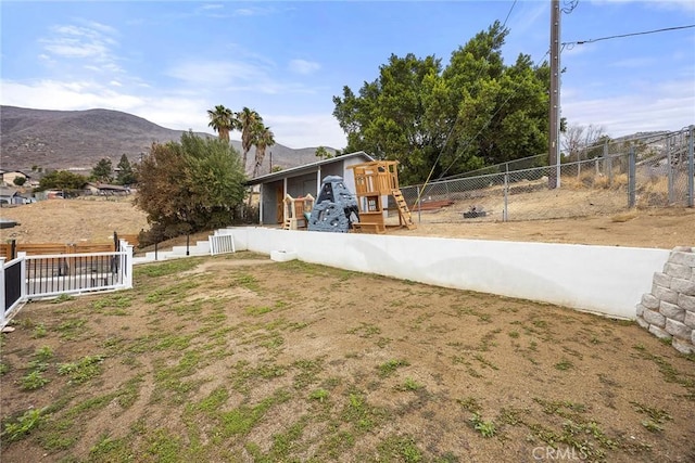 4021 Pikes Peak Dr, Norco, CA 92860 - view of yard featuring a playground and a mountain view