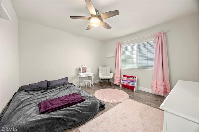 4021 Pikes Peak Dr, Norco, CA 92860 - bedroom featuring wood finished floors and a ceiling fan