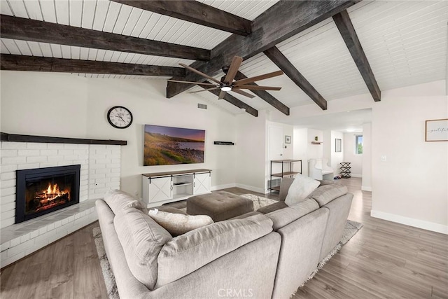 4021 Pikes Peak Dr, Norco, CA 92860 - living room with ceiling fan, a fireplace, wood finished floors, and wooden ceiling