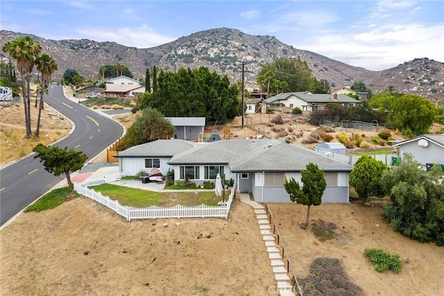 4021 Pikes Peak Dr, Norco, CA 92860 - view of front facade featuring a fenced backyard and a mountain view
