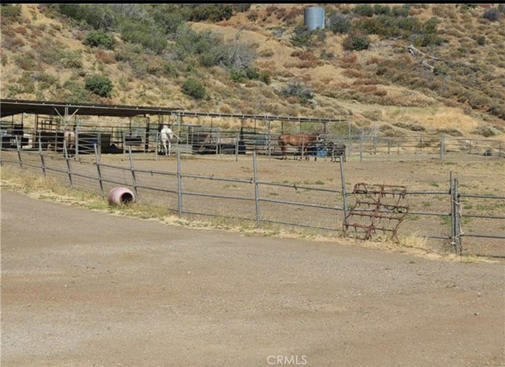 38810 Rogers Creek Rd, Palmdale, CA 93551 - view of yard with a rural view, an exterior structure, and an outdoor structure