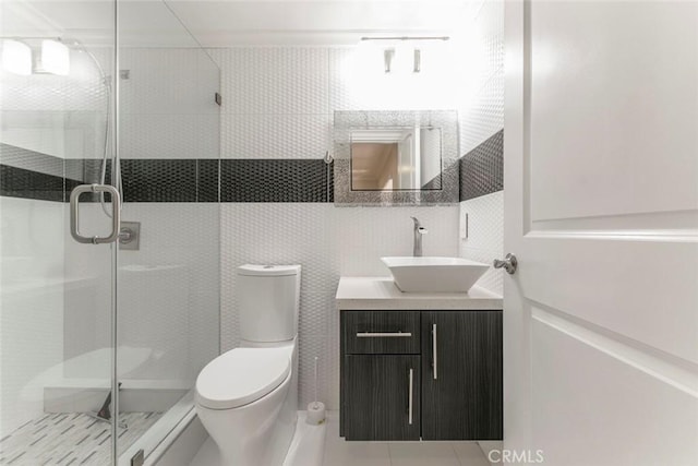 15114 Sherman Way Unit 106, Van Nuys, CA 91405 - bathroom featuring vanity, a shower stall, and tile patterned flooring