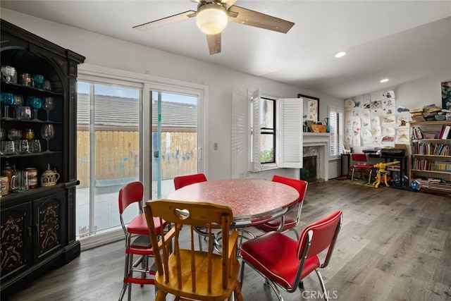 411 Spanish Moss Ln, Arroyo Grande, CA 93420 - dining space featuring ceiling fan, a fireplace, healthy amount of natural light, wood finished floors, and recessed lighting