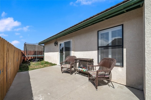 411 Spanish Moss Ln, Arroyo Grande, CA 93420 - fenced backyard with a trampoline and a patio