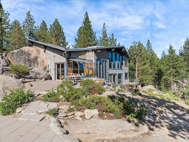 1082 Mountain Canary Dr, South Lake Tahoe, CA 96150 - back of property featuring a patio