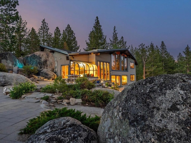 1082 Mountain Canary Dr, South Lake Tahoe, CA 96150 - rear view of house with a patio area