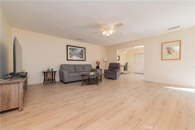 2245 Via Mariposa E Unit D, Laguna Woods, CA 92637 - living room featuring ceiling fan and light wood finished floors