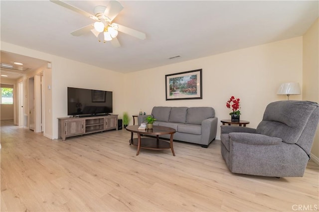 2245 Via Mariposa E Unit D, Laguna Woods, CA 92637 - living area featuring light wood finished floors and ceiling fan