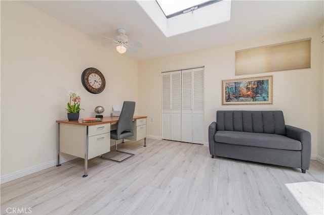 2245 Via Mariposa E Unit D, Laguna Woods, CA 92637 - office space with light wood-type flooring, a skylight, and ceiling fan