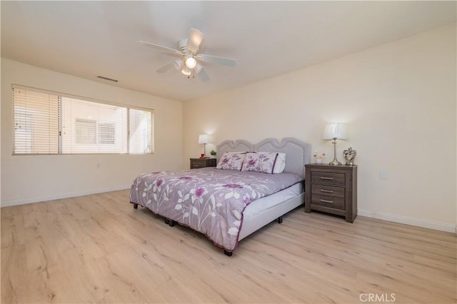 2245 Via Mariposa E Unit D, Laguna Woods, CA 92637 - bedroom featuring light wood-style flooring and a ceiling fan