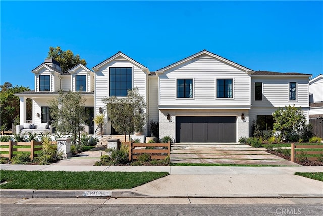 1963 Port Edward Pl, Newport Beach, CA 92660 - view of front of home with a garage, concrete driveway, and brick siding