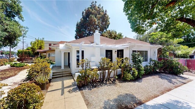 243 N Verdugo Rd, Glendale, CA 91206 - view of front of property featuring covered porch and a chimney