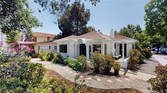 243 N Verdugo Rd, Glendale, CA 91206 - rear view of property with a chimney
