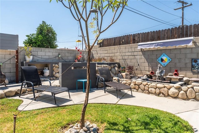 1504 Valaria Dr, Highland, CA 92346 - fenced backyard with a patio