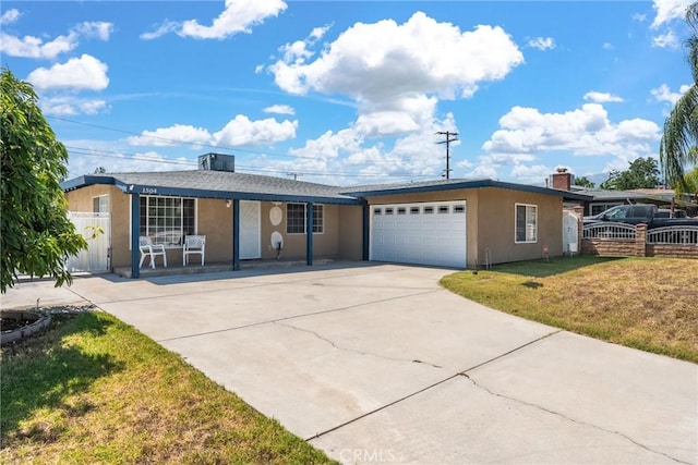 1504 Valaria Dr, Highland, CA 92346 - ranch-style home with an attached garage, stucco siding, and concrete driveway