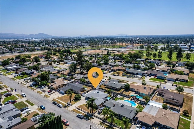 1504 Valaria Dr, Highland, CA 92346 - aerial view of property's location with mountains and nearby suburban area