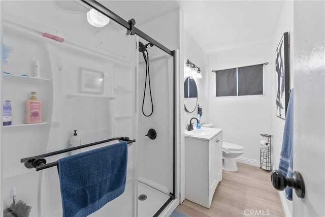 1504 Valaria Dr, Highland, CA 92346 - full bathroom featuring a shower stall, wood finished floors, and vanity