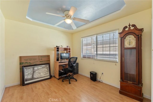 1504 Valaria Dr, Highland, CA 92346 - office space featuring a raised ceiling, wood finished floors, and ceiling fan