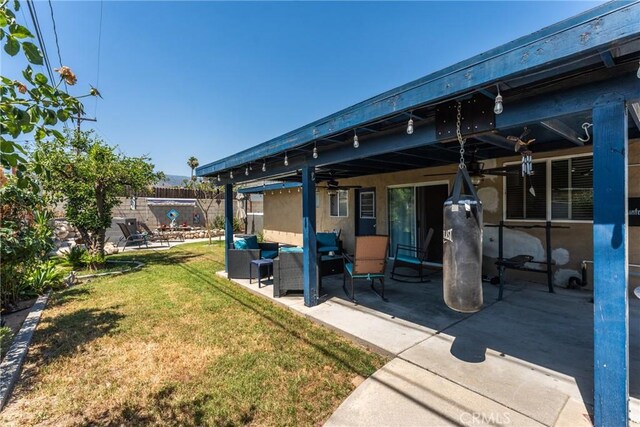 1504 Valaria Dr, Highland, CA 92346 - view of patio featuring an outdoor living space